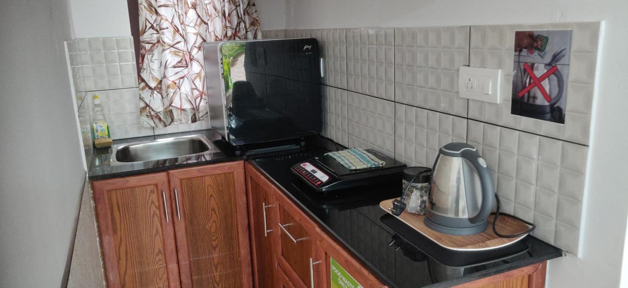 Dolphin Enclave Service Studio Apartments Калпетта Экстерьер фото